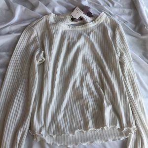 Fitted sweater with bow